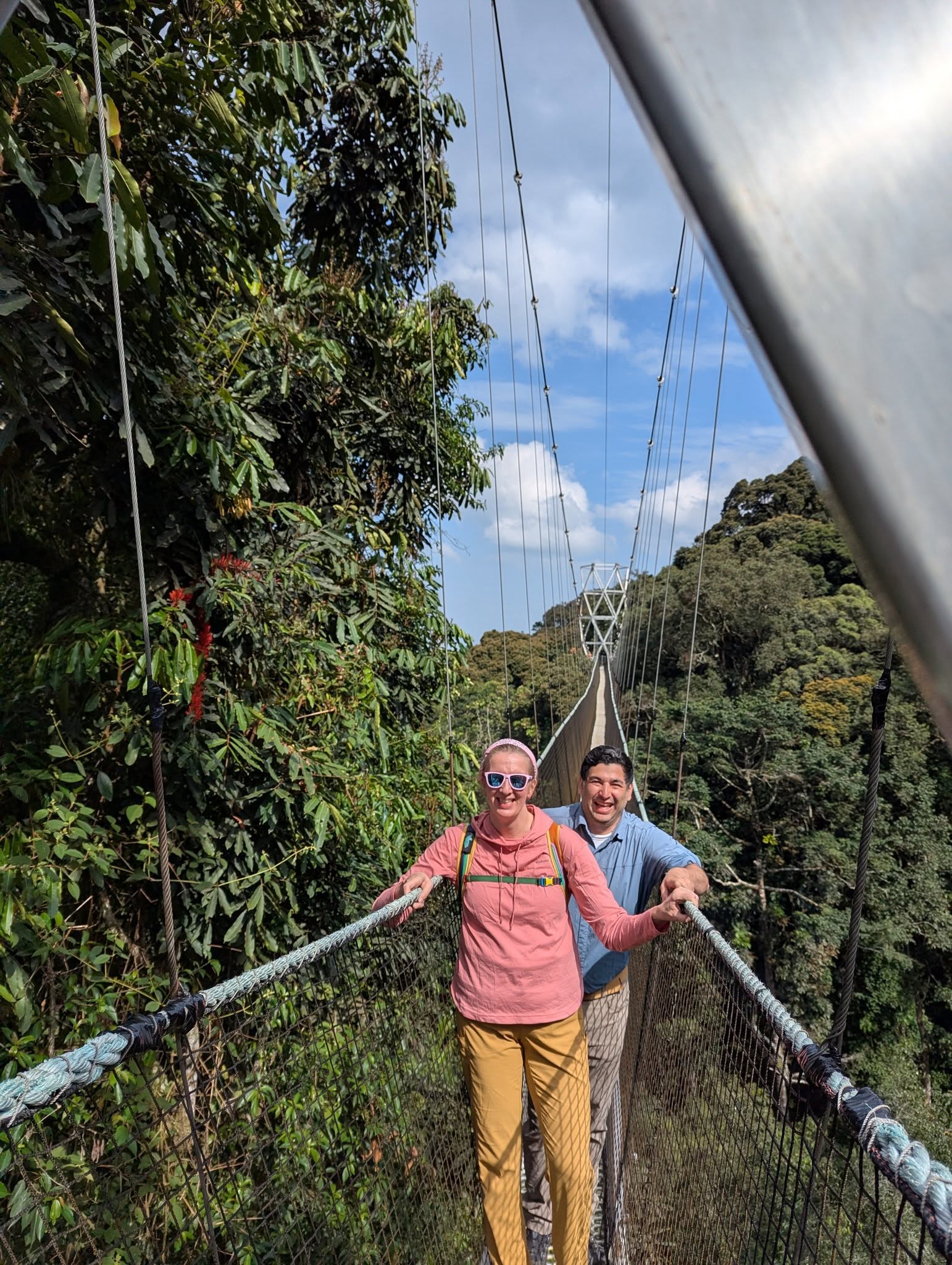 Tourist Enjoying Canopy Walk way